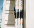 Retracted window awning